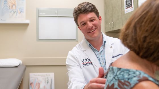 Dr. Pennington in exam room
